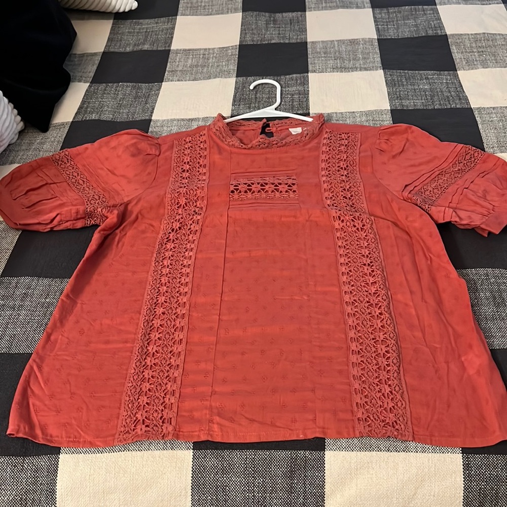 This a nice blouse size L that would be very comfortable wear.